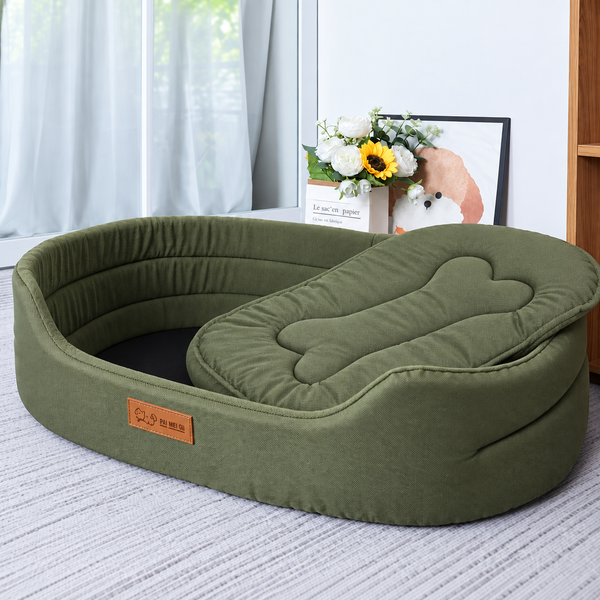 Sofá cama pet verde com almofada em formato de osso